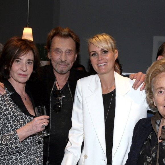 Exclusif - Muriel Bailleul (femme d'Eddy Mitchell), Johnny et Laeticia Hallyday, Bernadette Chirac - Bernadette Chirac, Laeticia et Johnny Hallyday sont venus applaudir Eddy Mitchell et Fred Testot qui se produisaient sur la scène du Théâtre de Paris, dans une pièce mise en scène par Stéphane Hillel, "Un singe en hiver" à Paris le 1er avril 2014.