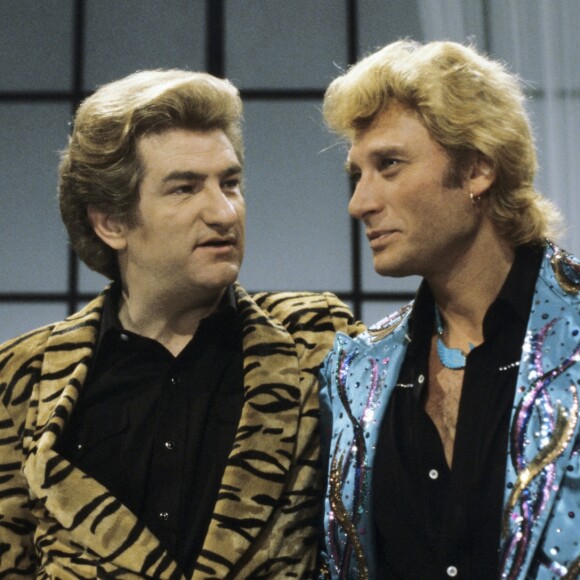 En France, à Paris, Eddy MITCHELL et Johnny HALLYDAY sur le plateau de l'émission "LA BONNE ANNEE D'EDDY MITCHELL : LA DERNIERE SEANCE : ALORS JE DIS BRAVO 1982". Le 31 décembre 1982 © Alain Canu via Bestimage