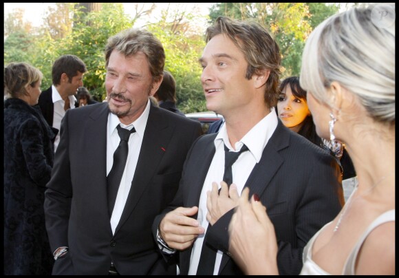 Johnny, Laeticia et David Hallyday à Paris en 2008