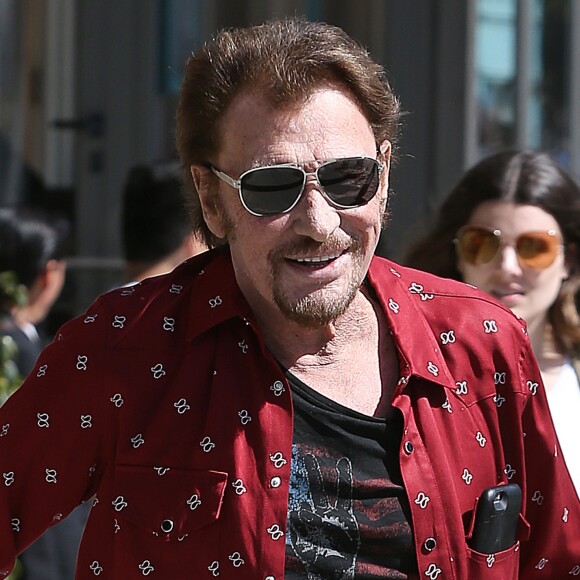 Johnny Hallyday avec sa femme Laeticia, leurs filles Jade et Joy, Marie Poniatowski avec son mari Pierre Rambaldi et leur fille Tess, à Santa Monica, le 1er avril 2017.