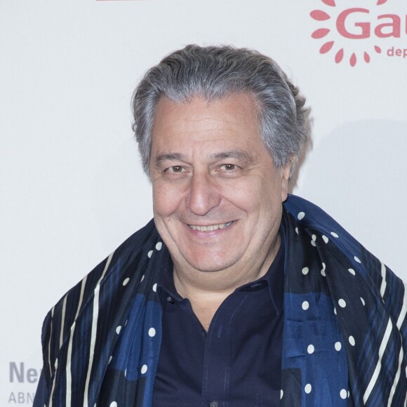Christian Clavier - Photocall de l'exposition "120 ans de Cinéma: Depuis que le Cinéma existe" au 104 à Paris le 13 avril 2015.
