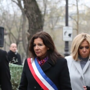 Emmanuel Macron et sa femme Brigitte Macron, Anne Hidalgo - Hommage aux victimes de l'attentat de Charlie Hebdo à Paris le 7 janvier 2018. L'attentat contre Charlie Hebdo est une attaque terroriste islamiste perpétrée contre le journal satirique Charlie Hebdo le 7 janvier 2015 à Paris, jour de la sortie du numéro 1 177 de l'hebdomadaire qui avait a fait 12 morts. © Stéphane Lemouton/Bestimage