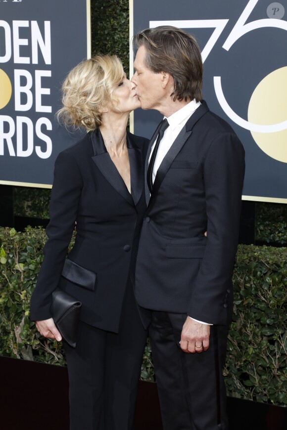 Kyra Sedgwick et son mari Kevin Bacon sur le tapis rouge de la 75ème cérémonie des Golden Globe Awards au Beverly Hilton à Los Angeles, le 7 janvier 2018.