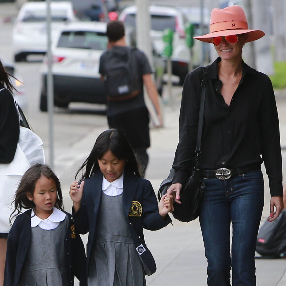 Exclusif - A peine rentrées de Saint-Barthelemy, Laeticia accompagnent leurs filles Jade et Joy pour la rentrée des classes a Pacific Palisades.