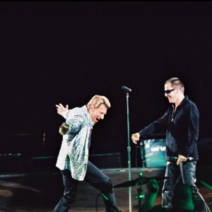 Johnny Hallyday en duo avec Florent Pagny au Stade de France, le 6 septembre 1998.