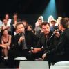 Muriel Robin, Michel Drucker, Johnny Hallyday et Florent Pagny dans l'émission "Tapis rouge", en 1999.