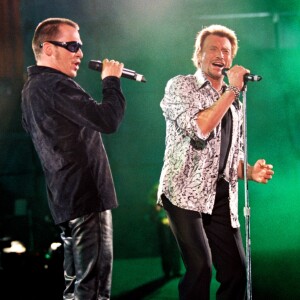 Johnny Hallyday en duo avec Florent Pagny au Stade de France, le 6 septembre 1998.