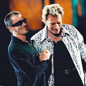 Johnny Hallyday en duo avec Florent Pagny au Stade de France, le 6 septembre 1998.
