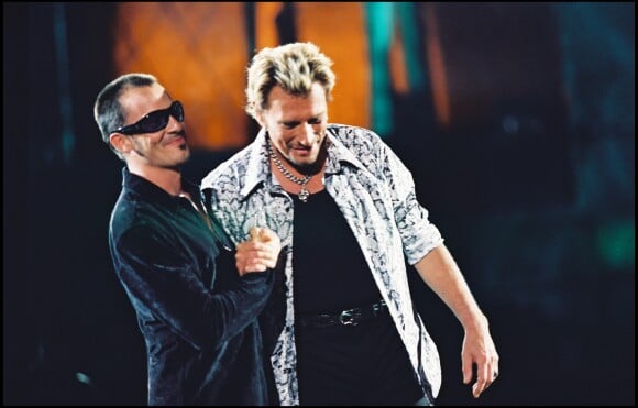 Johnny Hallyday en duo avec Florent Pagny au Stade de France, le 6 septembre 1998.