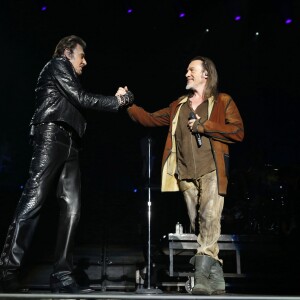Exclusif - Florent Pagny et Johnny Hallyday en duo lors du "Born Rocker Tour" à l'AccorHotels Arena (ex-Bercy) à Paris, le 14 juin 2013.