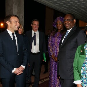 Le président de la République Emmanuel Macron, le président sénégalais Macky Sall et sa femme la Première Dame Marieme Faye Sall - Le président de la République française et sa femme la Première Dame sont accueillis par le président sénégalais et sa femme la Première Dame à l'aéroport international Léopold-Sédar-Senghor à Dakar, Sénégal, le 1er février 2018. © Dominique Jacovides/Bestimage  French President and his wife are welcomed by Senegalese President and his wife, Marieme Faye Sall at Leopold-Sedar-Senghor airport in Dakar, Senegal on February 2, 2018.01/02/2018 - Dakar