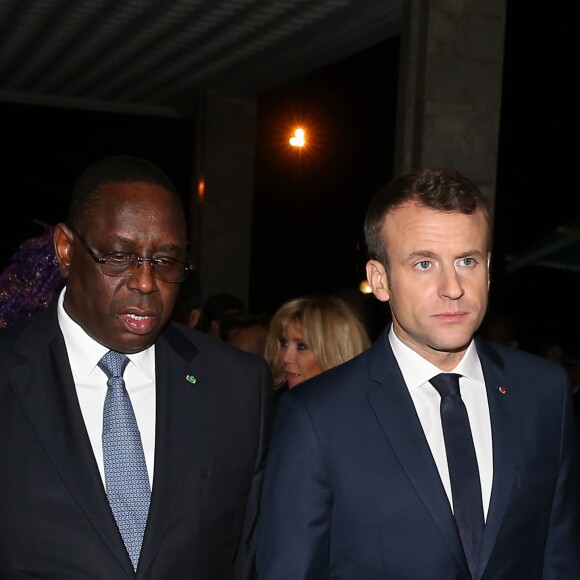 Le président de la République Emmanuel Macron et son homologue le président sénégalais Macky Sall - Le président de la République française et sa femme la Première Dame sont accueillis par le président sénégalais et sa femme la Première Dame à l'aéroport international Léopold-Sédar-Senghor à Dakar, Sénégal, le 1er février 2018. © Dominique Jacovides/Bestimage  French President and his wife are welcomed by Senegalese President and his wife, Marieme Faye Sall at Leopold-Sedar-Senghor airport in Dakar, Senegal on February 2, 2018.01/02/2018 - Dakar