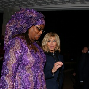 La Première Dame Brigitte Macron (Trogneux) et la Première Dame Marieme Faye Sall - Le président de la République française et sa femme la Première Dame sont accueillis par le président sénégalais et sa femme la Première Dame à l'aéroport international Léopold-Sédar-Senghor à Dakar, Sénégal, le 1er février 2018. © Dominique Jacovides/Bestimage  French President and his wife are welcomed by Senegalese President and his wife, Marieme Faye Sall at Leopold-Sedar-Senghor airport in Dakar, Senegal on February 2, 2018.01/02/2018 - Dakar