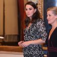 La duchesse Catherine de Cambridge, enceinte et en Erdem, et la comtesse Sophie de Wessex, en Burberry, étaient les maîtresses de cérémonie de la réception organisée pour célébrer le "Commonwealth Fashion Exchange" au Palais de Buckingham à Londres, le 19 février 2018.