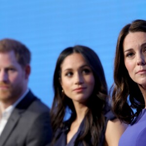 Harry, Meghan et Catherine. Kate Middleton, duchesse de Cambridge, enceinte de huit mois (en robe Seraphine), Meghan Markle (dans un ensemble Jason Wu), le prince William et le prince Harry étaient rassemblés pour la première fois en engagement public le 28 février 2018 pour le premier Forum annuel de la Fondation royale, au siège social d'Aviva à Londres, autour du thème "Changer les choses ensemble".