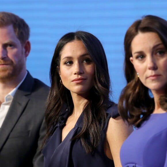 Harry, Meghan et Catherine. Kate Middleton, duchesse de Cambridge, enceinte de huit mois (en robe Seraphine), Meghan Markle (dans un ensemble Jason Wu), le prince William et le prince Harry étaient rassemblés pour la première fois en engagement public le 28 février 2018 pour le premier Forum annuel de la Fondation royale, au siège social d'Aviva à Londres, autour du thème "Changer les choses ensemble".