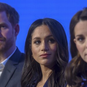 Harry, Meghan et Catherine. Kate Middleton, duchesse de Cambridge, enceinte de huit mois (en robe Seraphine), Meghan Markle (dans un ensemble Jason Wu), le prince William et le prince Harry étaient rassemblés pour la première fois en engagement public le 28 février 2018 pour le premier Forum annuel de la Fondation royale, au siège social d'Aviva à Londres, autour du thème "Changer les choses ensemble".