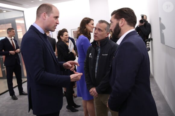 Le prince Harry, Meghan Markle (dans un ensemble Jason Wu), la duchesse Catherine de Cambridge (robe de grossesse Seraphine), enceinte, et le prince William étaient rassemblés pour la première fois en engagement public le 28 février 2018 pour le premier Forum annuel de la Fondation royale, au siège social d'Aviva à Londres, autour du thème "Changer les choses ensemble".