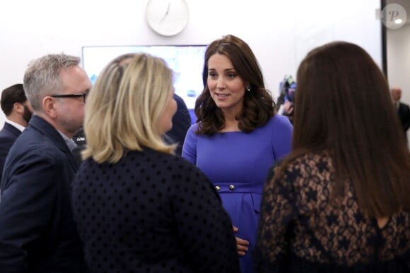 Le prince Harry, Meghan Markle (dans un ensemble Jason Wu), la duchesse Catherine de Cambridge (robe de grossesse Seraphine), enceinte, et le prince William étaient rassemblés pour la première fois en engagement public le 28 février 2018 pour le premier Forum annuel de la Fondation royale, au siège social d'Aviva à Londres, autour du thème "Changer les choses ensemble".