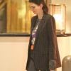 Exclusif - Kendall Jenner sort de l'hôtel Waldorf Astoria à Beverly Hills le 12 mars 2018.  Exclusive - Germany call for price - Supermodel Kendall Jenner is seen leaving the Waldorf Astoria Hotel in Beverly Hills. She tones down a striped blazer in a band tee and gray pants. Kendall arrived 4 hours earlier with rumored beau Blake Griffin for a quiet evening out after her sister's baby shower the day before in Beverly Hills March 12, 2018.12/03/2018 - Beverly Hills