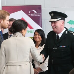 Le prince Harry et Meghan Markle en visite à Belfast en Irlande du Nord le 23 mars 2018, à l'Eikon Centre pour un événement consacré à la 2e année d'Amazing the Space, initiative de pacification lancée par le prince en septembre 2017.