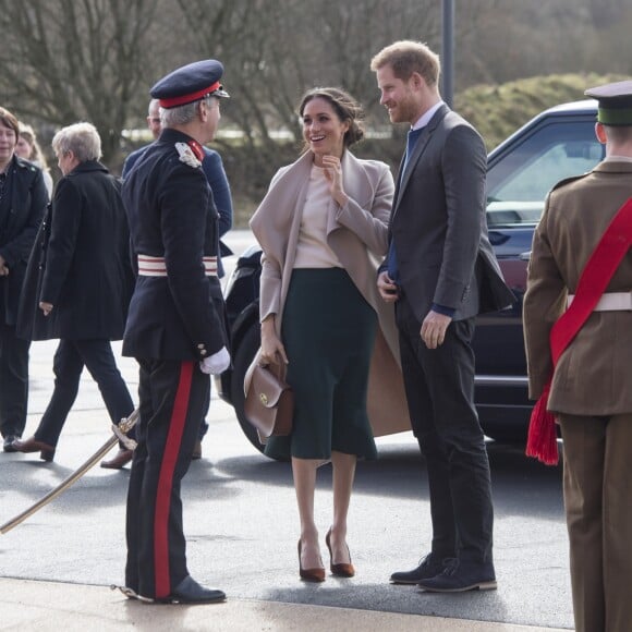 Le prince Harry et Meghan Markle en visite à Belfast en Irlande du Nord le 23 mars 2018, à l'Eikon Centre pour un événement consacré à la 2e année d'Amazing the Space, initiative de pacification lancée par le prince en septembre 2017.