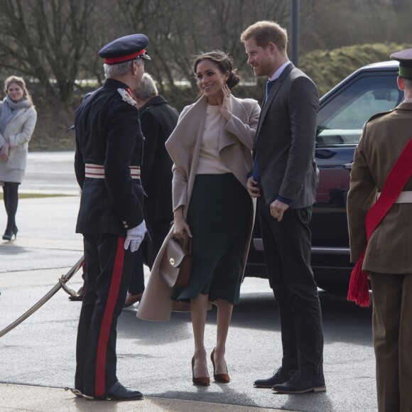 Le prince Harry et Meghan Markle en visite à Belfast en Irlande du Nord le 23 mars 2018, à l'Eikon Centre pour un événement consacré à la 2e année d'Amazing the Space, initiative de pacification lancée par le prince en septembre 2017.