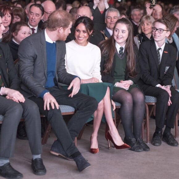 Le prince Harry et Meghan Markle en visite à Belfast en Irlande du Nord le 23 mars 2018, à l'Eikon Centre pour un événement consacré à la 2e année d'Amazing the Space, initiative de pacification lancée par le prince en septembre 2017.