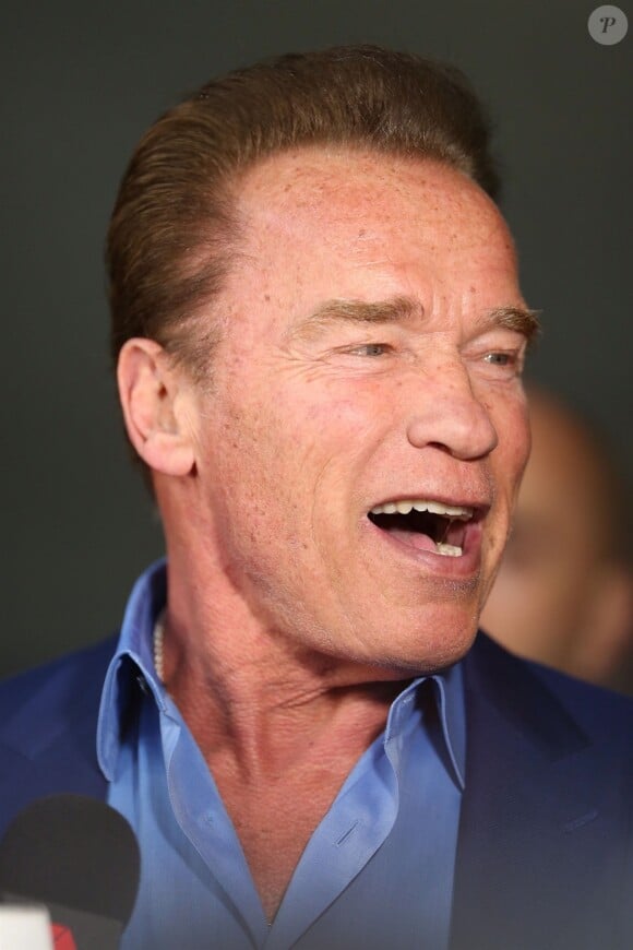 Arnold Schwarzenegger arrive à l'aéroport de Melbourne, le 15 mars 2018.