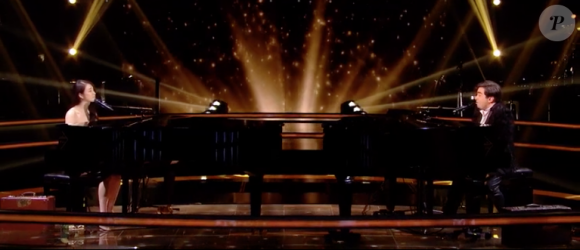 Ubare face à Frédéric Longbois dans The Voice 7 sur TF1 le 7 avril 2018.