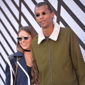 Le chanteur Stromae et Coralie Barbier - People sortant du défilé de mode "Louis Vuitton", collection prêt-à-porter Printemps-Eté 2017 à Paris, le 5 octobre 2016. © CVS/Veeren/Bestimage