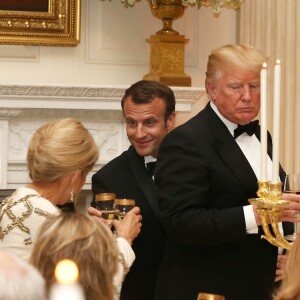 Le président américain Donald Trump, le président de la République française Emmanuel Macron et sa femme la première Dame Brigitte Macron (Trogneux) -  Dîner en l'honneur du Président de la République Emmanuel Macron et de la première dame Brigitte Macron (Trogneux) à la Maison Blanche à Washington, le 24 avril 2018.