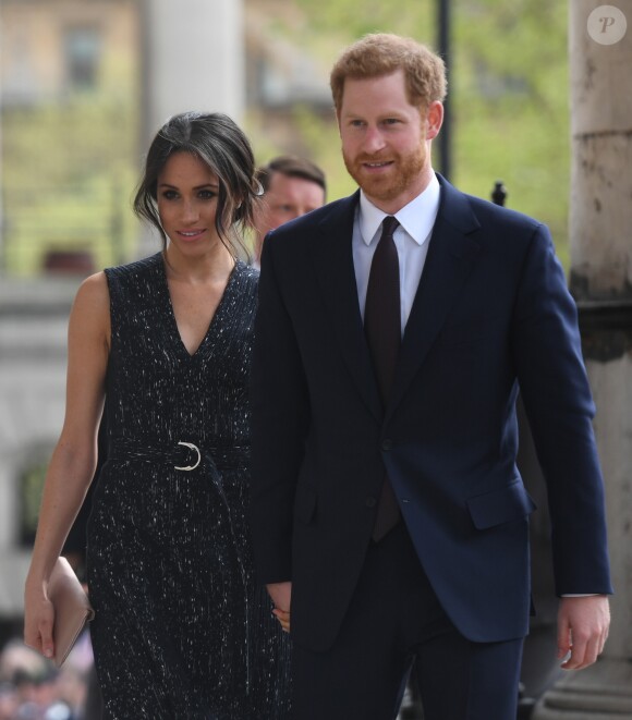 Meghan Markle et le prince Harry à leur arrivée à la cérémonie de commémoration du 25ème anniversaire de l'assassinat de Stephen Lawrence en l'église St Martin-in-the-Fields à Londres. Le 23 avril 2018