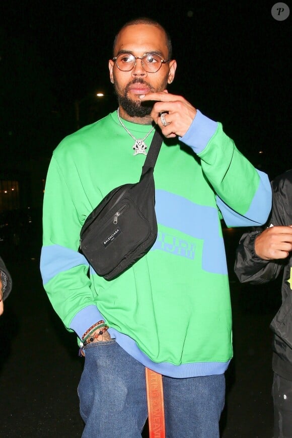 Chris Brown est allé faire la fête avec des amies chez Poppy à West Hollywood, le 5 avril 2018