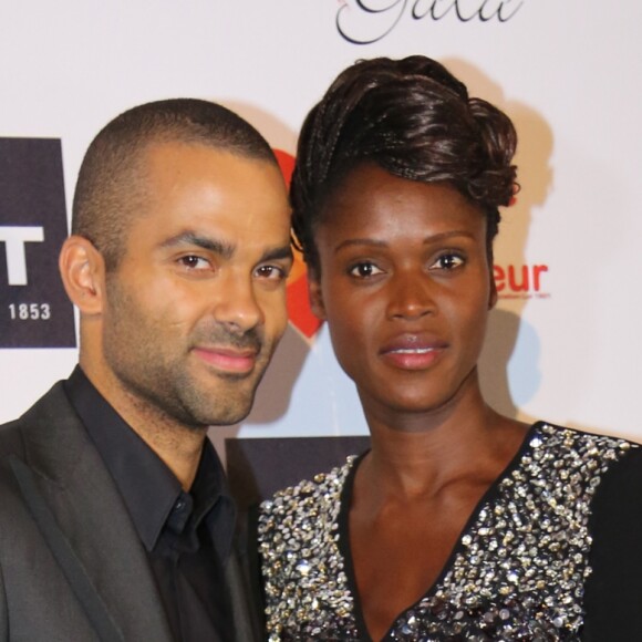 Tony Parker, Emilie Gomis (habillee en Paule Ka) - Tony Parker parraine le 8eme gala de charite "Par Coeur" pour l'association "Make a Wish" a l' abbaye Paul Bocuse a Collonges le 26 septembre 2013.