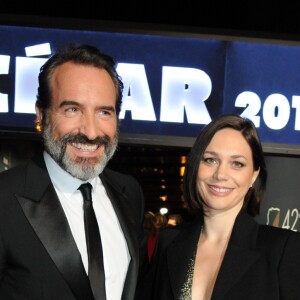 Exclusif - Jean Dujardin et sa compagne Nathalie Péchalat - Arrivées à la 42ème cérémonie des Cesar à la salle Pleyel à Paris, le 24 février 2017.