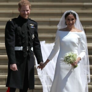 Le prince Harry, duc de Sussex, et Meghan Markle, duchesse de Sussex, à la sortie de chapelle St. George au château de Windsor - Sortie après la cérémonie de mariage du prince Harry et de Meghan Markle en la chapelle Saint-George au château de Windsor, Royaume Uni, le 19 mai 2018.