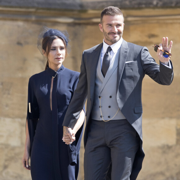 David et Victoria Beckham assistent au mariage du prince William et de Meghan Markle à la chapelle St. George au château de Windsor. Le 19 mai 2018.