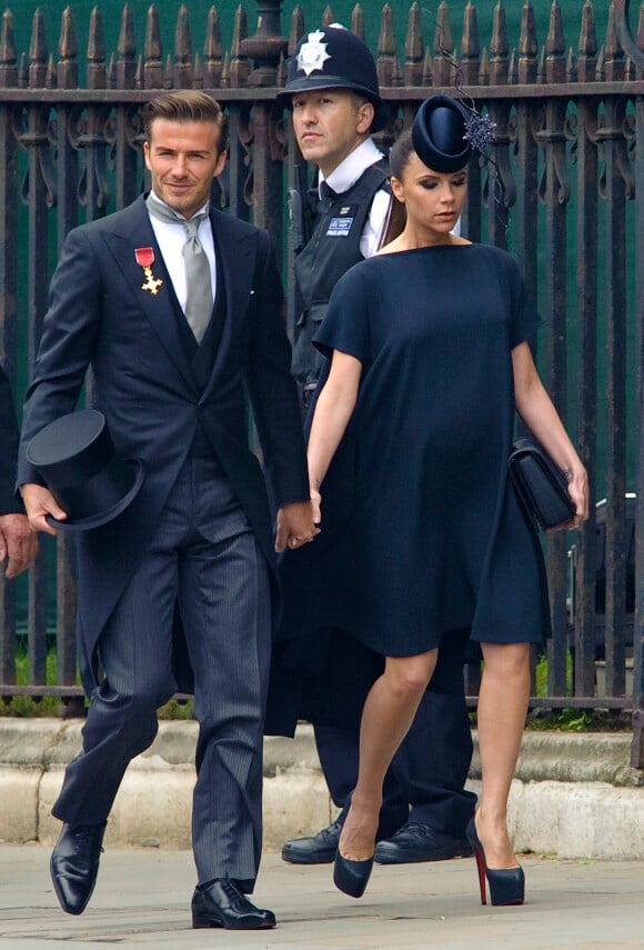 David et Victoria Beckham, enceinte de leur 4e enfant (une fille qu'ils prénommeront Harper) assitent au mariage du prince William et de Kate Middleton à l'abbaye de Westminster. Londres, le 29 avril 2011.