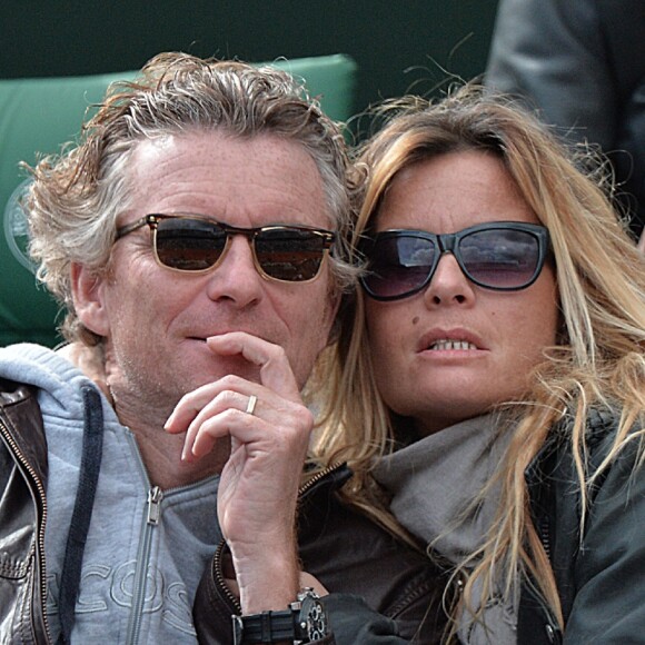 Denis Brogniart et sa femme Hortense assistent au match de Gael Monfils au 2eme Tour des Internationaux de France de tennis de Roland Garros le 29 mai 2013.