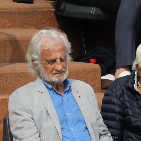 Jean-Paul Belmondo, Charles Gérard, Isabelle Huppert et Mansour Bahrami dans les tribunes des Internationaux de France de Tennis de Roland Garros à Paris, le 10 juin 2018. © Dominique Jacovides - Cyril Moreau/Bestimage