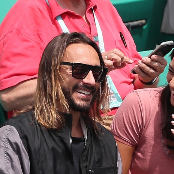 Bob Sinclar et une amie dans les tribunes des internationaux de Roland Garros - jour 5 - à Paris, France, le 31 mai 2018. © Cyril Moreau - Dominique Jacovides/Bestimage