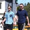 Exclusif - Sam Smith se promène main dans la main avec son compagnon Brandon Flynn à Los Angeles, le 6 mars 2018