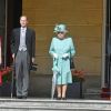 La reine Elizabeth II d'Angleterre, en compagnie du le prince Edward, comte de Wessex, de sa femme la comtesse Sophie de Wessex et du prince Andrew, duc d'York lors d'une garden party au palais de Buckingham à Londres le 15 mai 2018.