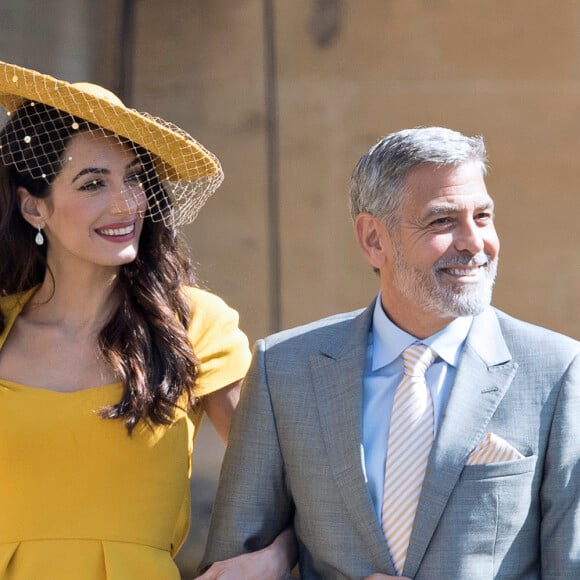 George Clooney et sa femme Amal Clooney - Les invités à la sortie de la chapelle St. George au château de Windsor, Royaume Uni, le 19 mai 2018.