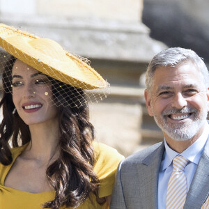 George Clooney et sa femme Amal Clooney - Les invités à la sortie de la chapelle St. George au château de Windsor, Royaume Uni, le 19 mai 2018.