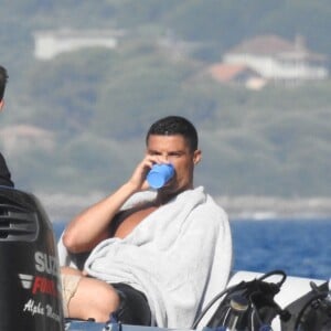 Exclusif - Cristiano Ronaldo et sa compagne Georgina Rodriguez font de la plongée sous-marine pendant leurs vacances en Grèce, le 8 juillet 2018.