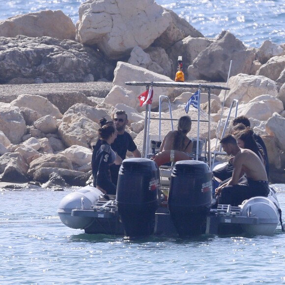 Exclusif - Cristiano Ronaldo et sa compagne Georgina Rodriguez font de la plongée sous-marine pendant leurs vacances en Grèce, le 8 juillet 2018.