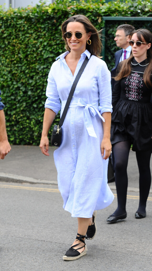 Pippa Middleton (enceinte) (robe Ralph Lauren) à son arrivée au tournoi de tennis de Wimbledon à Londres. Le 11 juillet 2018