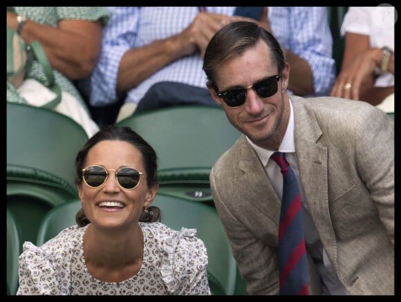 Pippa Middleton, enceinte, et son mari James Matthews au tournoi de Wimbledon à Londres, le 13 juillet 2018.